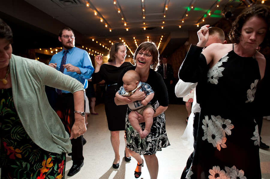 trinity-episcopal-terrys-catering-bloomington-wedding-17 hilarious moment of a baby doing the electric slide at a wedding
