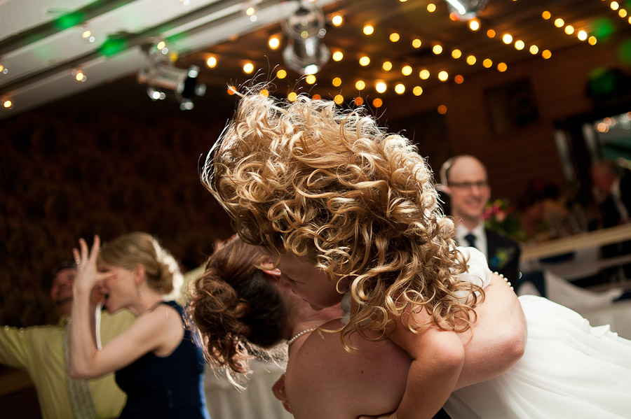 trinity-episcopal-terrys-catering-bloomington-wedding-19 cool photo of hair flying while dancing at wedding