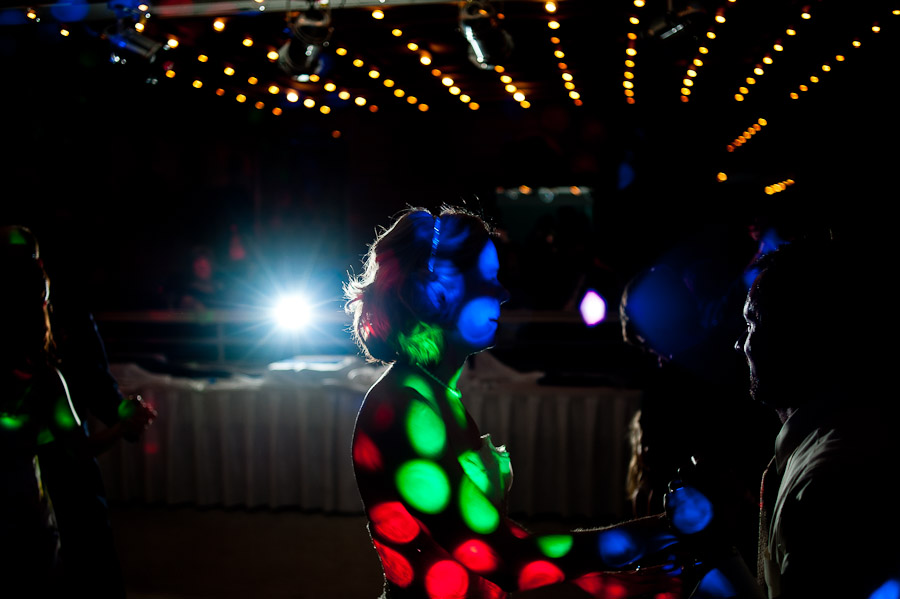 trinity-episcopal-terrys-catering-bloomington-wedding-21 hilarious quirky photo of bride covered by DJ lights