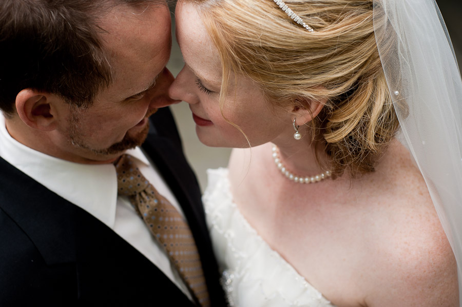 trinity-episcopal-terrys-catering-bloomington-wedding-07 sweet moment of bride and groom at wedding