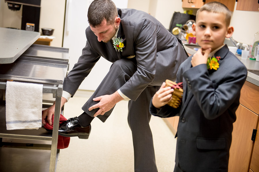 Nashville-Indiana-Brown-County-Wedding-Photography-Julianna-Levi-02 Pre-wedding shoe shine photograph at St. Agnes Church in Nashville, Indiana