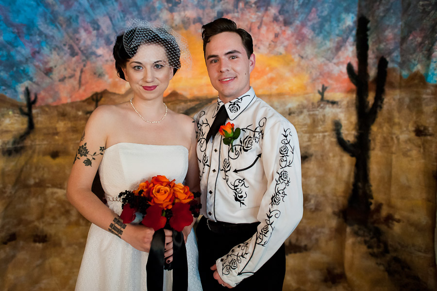 bloomington-honky-tonk-wedding-photos-13 wedding portrait in front of DIY western backdrop