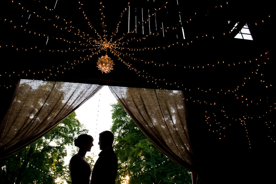 Dulls-Tree-Farm-Wedding-Photography-Indiana-Anna-Dan-18 fun and dramatic silhouette photo of bride and groom at Indiana barn wedding