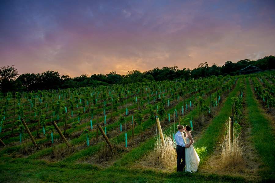 Bluemont-Vineyard-Wedding-Photography-Katie-Doug-17 romantic, colorful, unique, vineyard sunset portrait of wedding couple at Virginia winery